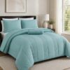 Five-piece queen size quilt set in blue.