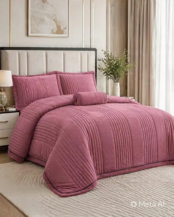 5-Piece Queen Quilt Set 4 Five-piece pink queen quilt bedding set with matching shams and decorative pillows.