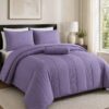 Purple 5-piece queen size quilt bedding set with matching decorative shams.